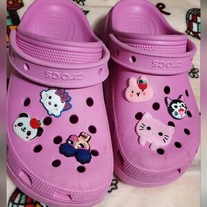 Crocs Pink Clogs with Fun Charms